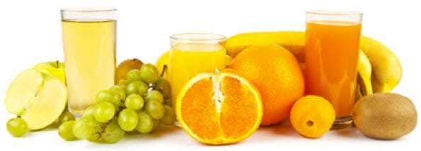 Various fruits and fruit juices in a row