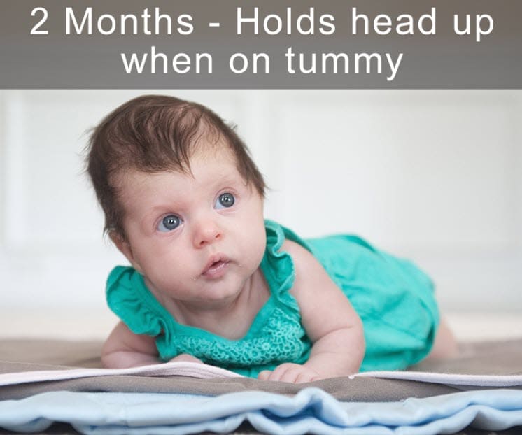 A baby holding its head up