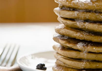 A stack of Multi-Grain Pancakes on a plate