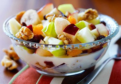 Fruits and nuts in soy milk in a bowl